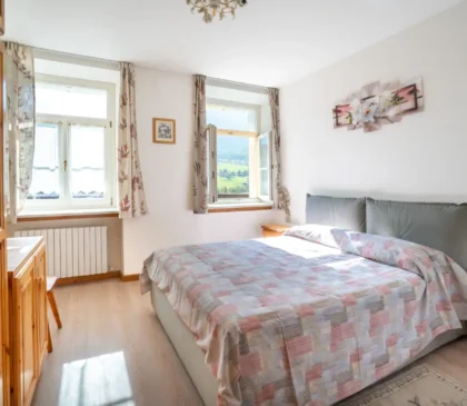 Camera matrimoniale luminosa e confortevole nell’appartamento Via Faloria a Cortina d’Ampezzo